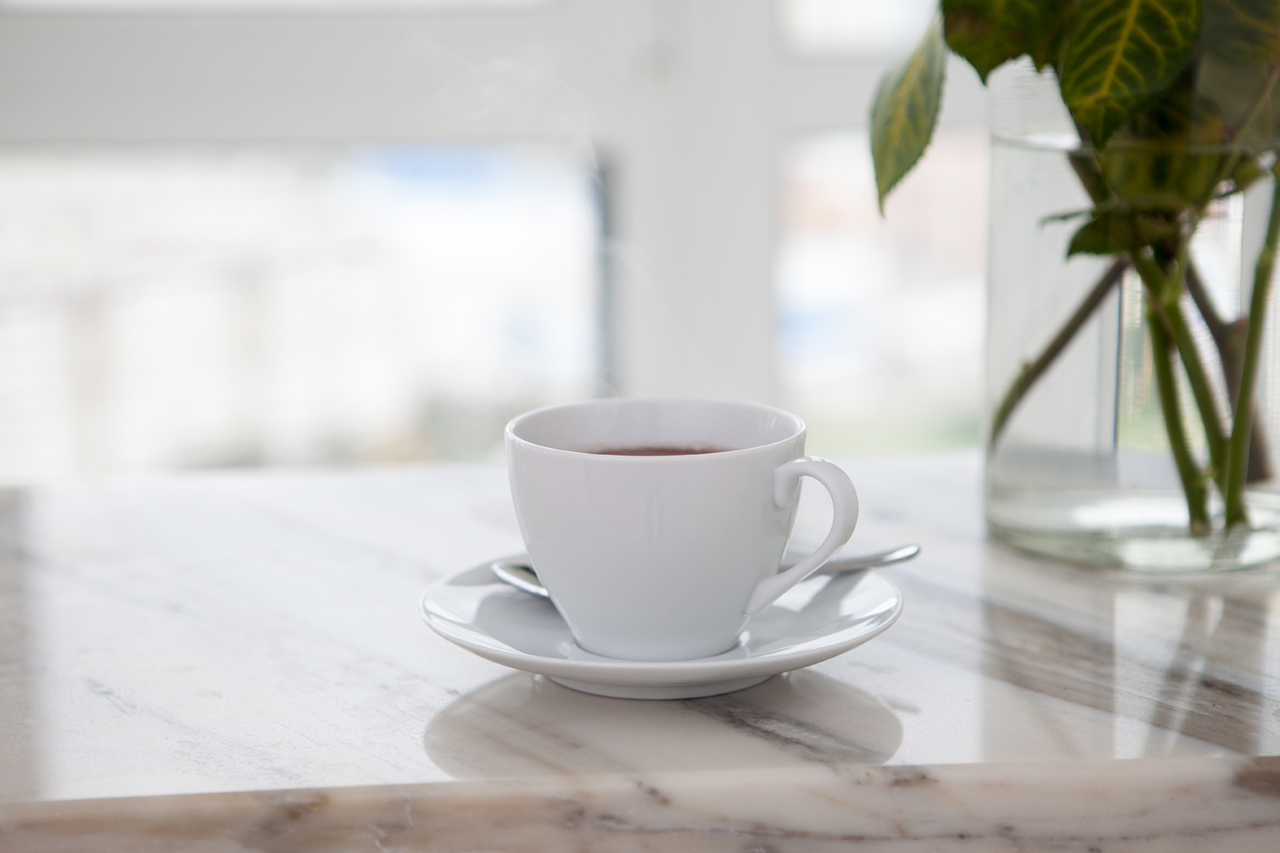 cup of coffee on marble table